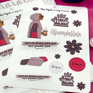 May include: A set of stickers featuring a woman wearing a hijab, a quote from the Quran, a flower, a pillow, and the words "My Hijab My Crown" and "Alhamdulilah".