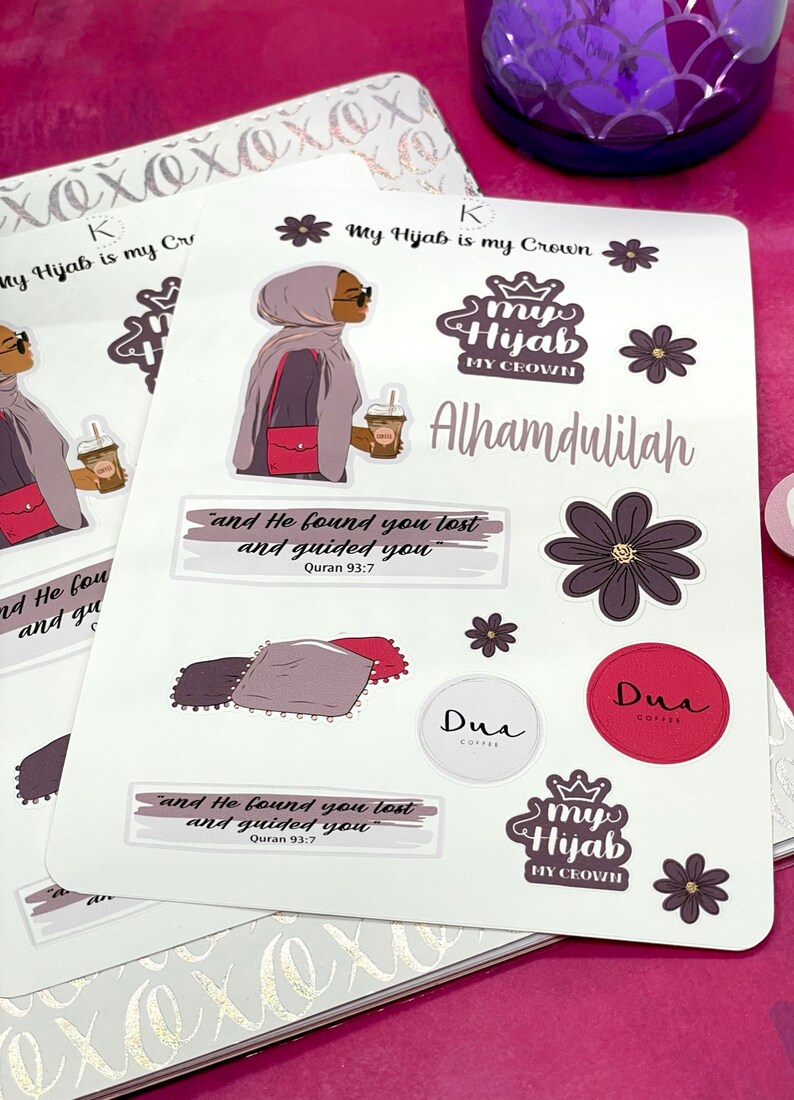 May include: A set of stickers featuring a woman wearing a hijab, a quote from the Quran, a flower, a pillow, and the words "My Hijab My Crown" and "Alhamdulilah".