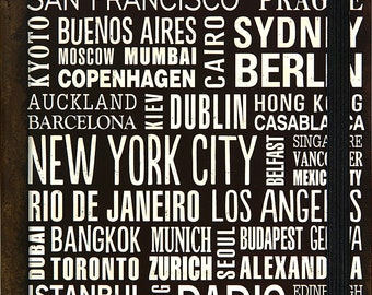 Travel Cities Journal - Embossed International City Names - Hardcover - Measures 6 x 8 - Elastic Wraparound Band - 160 Lined Pages