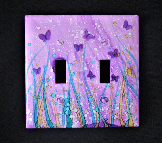 Fake Butterflies On A Lightswitch Poster by - Fine Art America