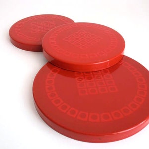 Set of three Silit bright red enamel coasters, oven cover plates op art design mid cetury enamel coaster West Germany 1970s, op art coasters
