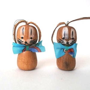2 vintage easter rabbits hanging ornaments, wooden easter decor german folk art, Erzgebirge ore mountains GDR, bunny rabbit animal figurine