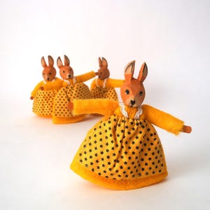 Vintage set of 4 egg warmers made by Lotte Sievers Hahn, handmade egg warmers with with carved bunny heads