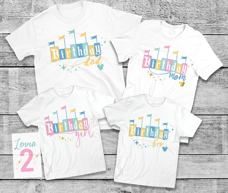 May include: Four white t-shirts with a colorful castle design and the words "Birthday dad", "Birthday mom", "Birthday girl", and "Birthday bro".