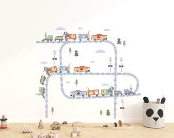 May include: A wall decal set featuring a winding gray train track with multiple colorful train cars carrying various animals. The design includes small green trees, clouds, and railroad crossing signs, creating a playful scene for a room.