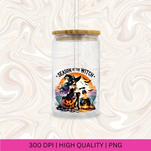May include: A clear glass tumbler with a bamboo lid and a straw. The tumbler features a graphic of a witch stirring a cauldron with the text "Season of the Witch".