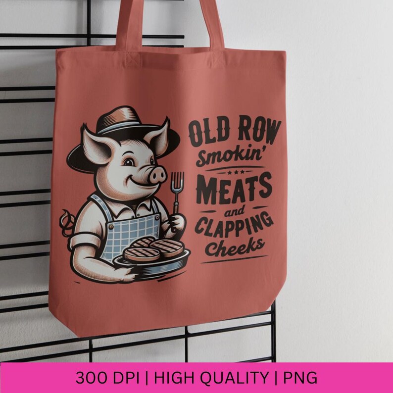 May include: A red tote bag with a cartoon pig wearing a hat and holding a fork and a plate of grilled meat. The text on the bag reads "Old Row Smokin' Meats and Clapping Cheeks."
