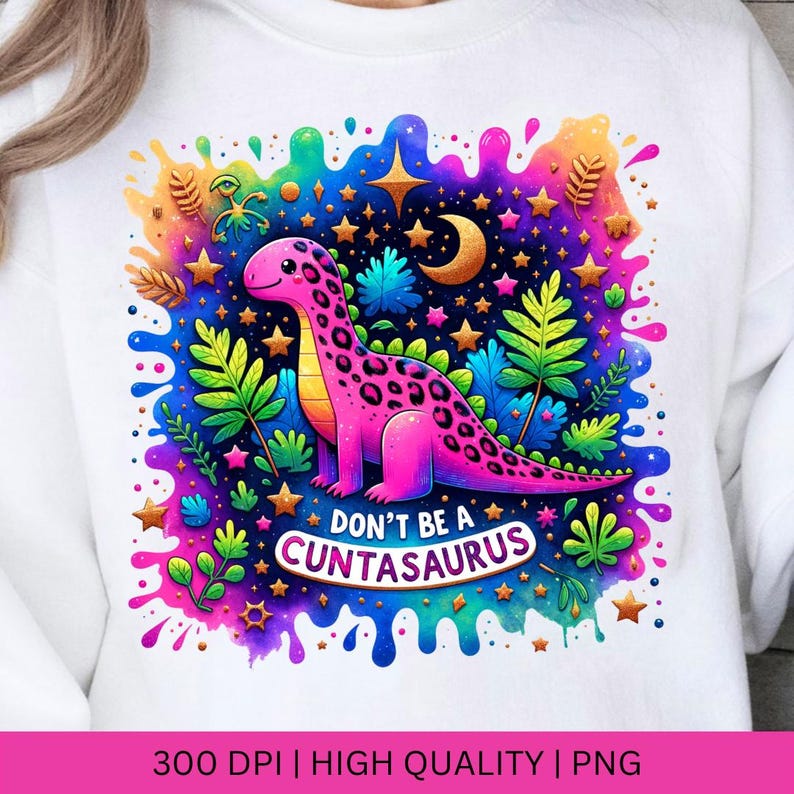 May include: A pink dinosaur with black spots stands on a colorful background with stars, a crescent moon, and green leaves. The text "Don't be a Cuntasaurus" is written in white letters on a blue background.