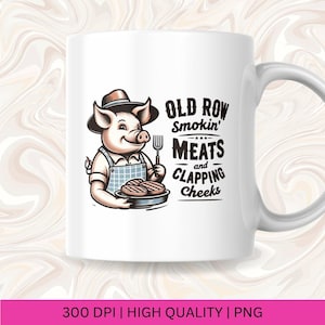 May include: White ceramic mug with a cartoon pig wearing a hat and holding a plate of grilled meat. The text on the mug reads "Old Row Smokin' Meats and Clapping Cheeks".