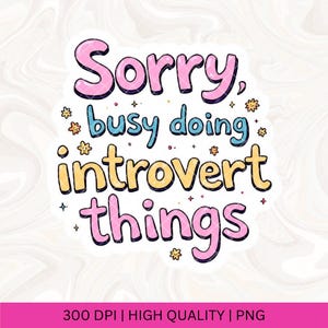 May include: A pink, blue and yellow graphic design with the text "Sorry, busy doing introvert things".