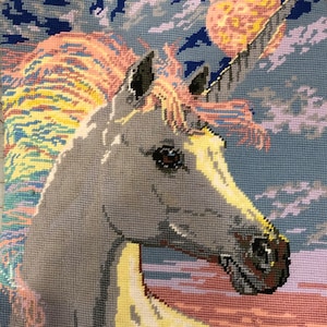Dozens of completed needlepoints from which to choose. Here are just a few. NOT YET PRICED