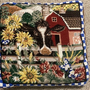 Dozens of completed needlepoints from which to choose. Here are just a few. NOT YET PRICED