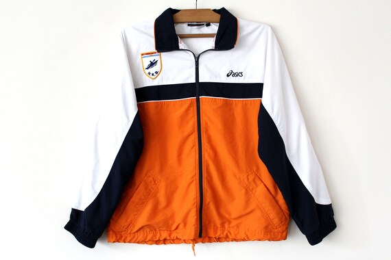 white and orange tracksuit