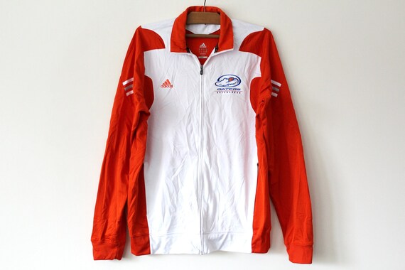 orange and white adidas tracksuit