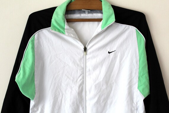 white and green nike jacket