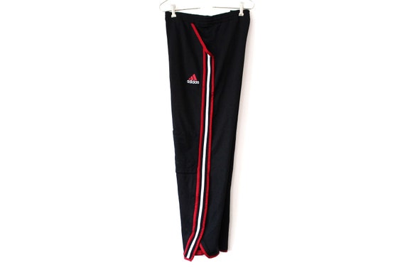 red and black adidas pants