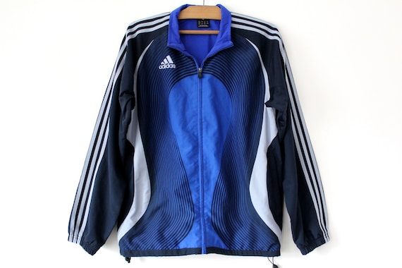 blue and black adidas tracksuit