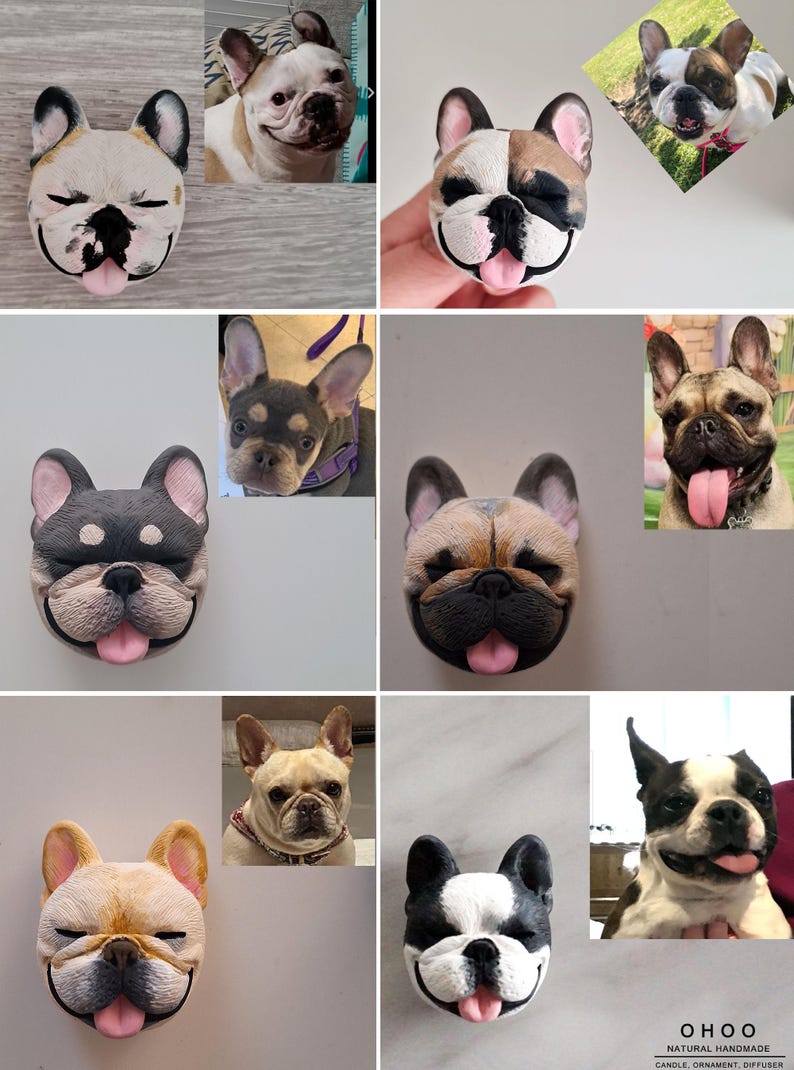 May include: A collection of six handmade French Bulldog head ornaments, each featuring distinct coat colors including fawn, brindle, and pied patterns. Each ornament displays a smiling expression with a pink tongue and upright ears. Text reads OHOO.