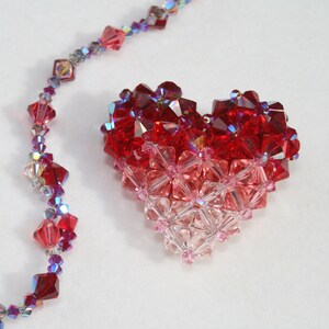 Cuore 3D e bracciale in cristalli Swarovski, colore Rosso in 4 gradazioni fatto a mano in Italia