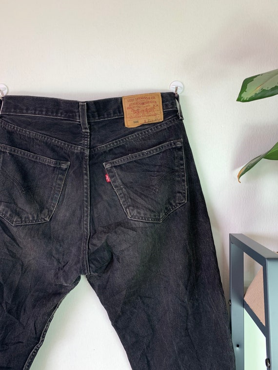 Vintage Levis 501 Black Distressed Denim Jeans / B
