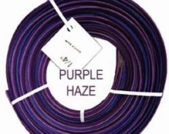 May include: A roll of purple and blue colored cord with a white tag that says "Purple Haze" and "1/4"
