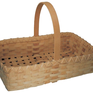 May include: A natural woven basket with a rectangular shape and a single wooden handle. The basket is made of light brown, natural materials and has a woven pattern.