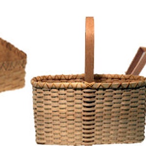K&ouml;nnte beinhalten: Drei geflochtene K&ouml;rbe mit Griffen, einer ist ein Kit mit Anleitung. Das Kit enth&auml;lt einen Holzrahmen und geflochtene Schilfrohre. Die Anleitung ist f&uuml;r ein "Korb-Kit Special".