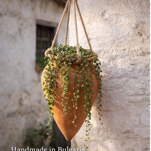 Maceta de terracota vintage con forma de ánfora, hecha a mano, de barro rústico, para jardín.