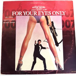 May include: Vintage vinyl record album cover for the James Bond film "For Your Eyes Only." The cover features a woman's legs, a man in a tuxedo holding a gun, and the film's title in large white letters against a red background.