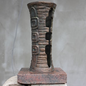 Vintage Bronze Grave Vase for Dried Arrangements on a red marble base