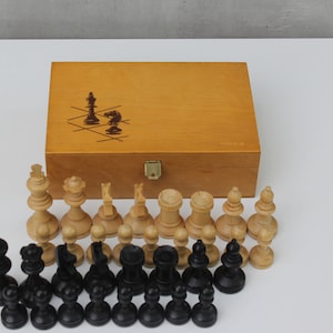 Chess pieces in box with Wooden Chess Figures Storage box