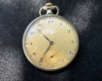 Reloj de bolsillo Omega vintage: movimiento suizo de 15 rubíes de 1935