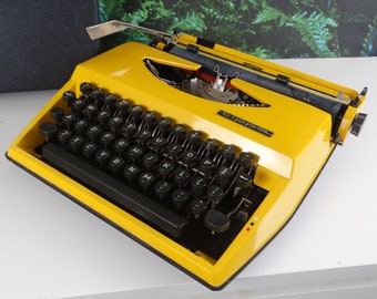 Lebber vintage® - Máquina de escribir Triumph Tippa vintage, Amarilla. ¡En un caso difícil!