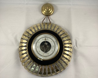 Vintage 1950s barometer of brass.