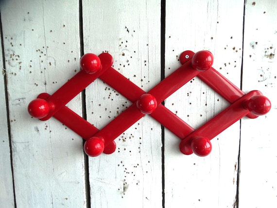 Lebber vintage® - Vintage red accordion coat rack, 1970s, red plastic.
