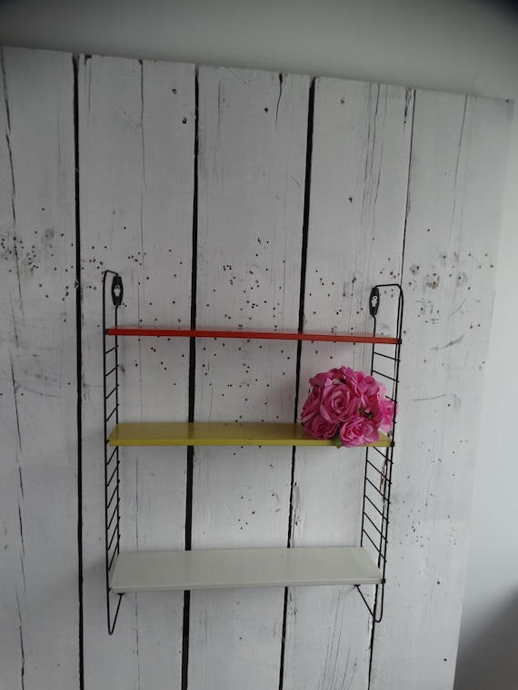 Lebber vintage® - Tomado pocket wall rack, by D. Dekker for Tomado, 1960S with bookends.
