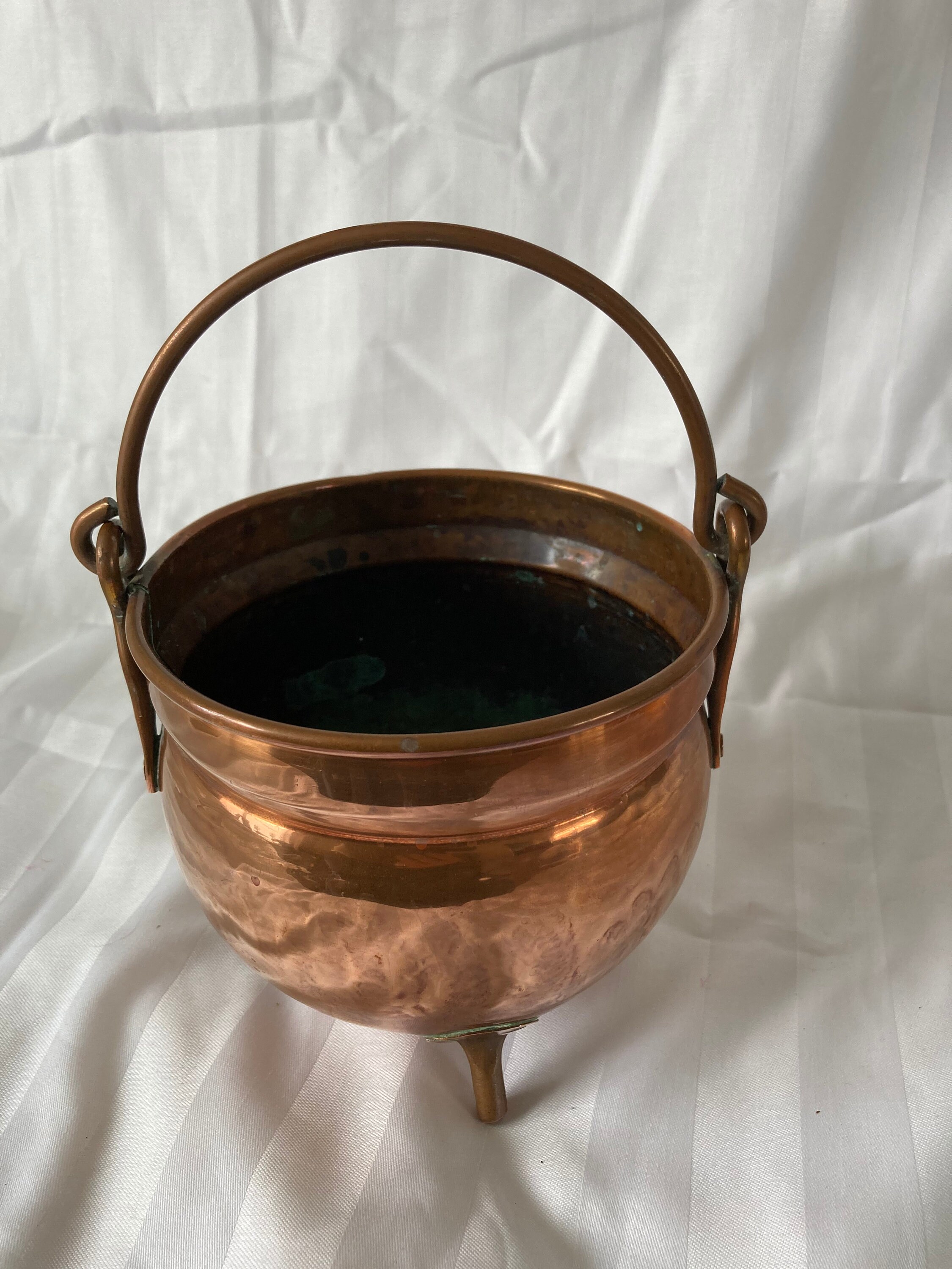 Antique copper flower pot with handle.