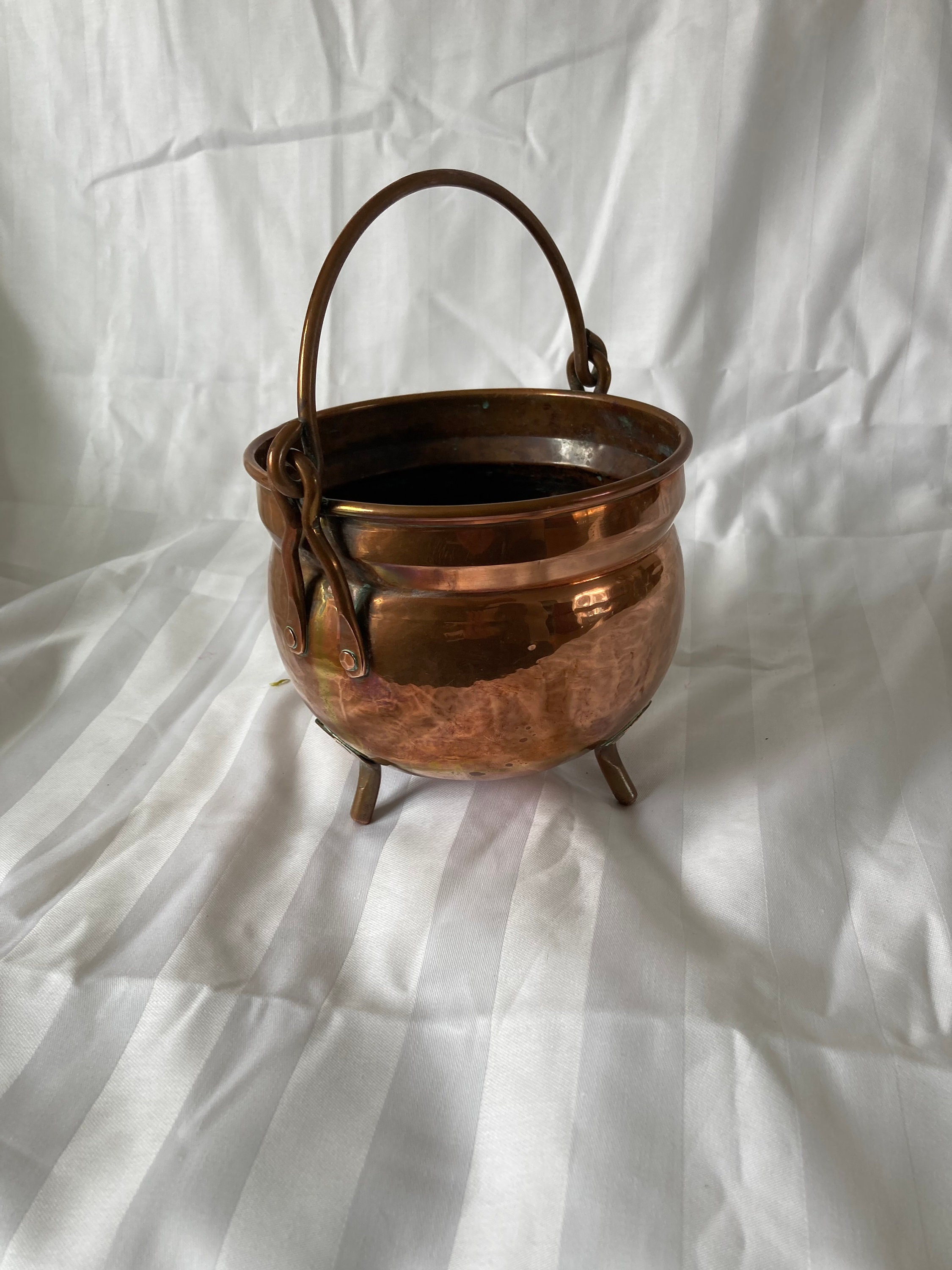 Antique copper flower pot with handle.