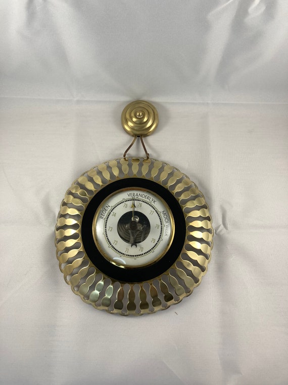 Vintage 1950s barometer of brass.