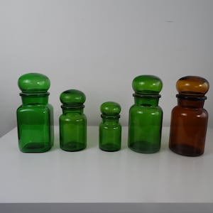 Apothecary jar with round loose cap, green glassware 1970s | Drugstore storage jars, vintage green glass.