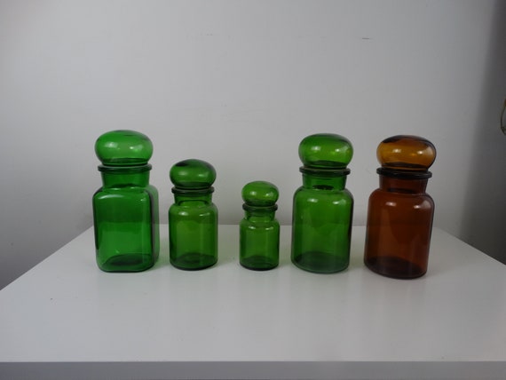 Apothecary jar with round loose cap, green glassware 1970s | Drugstore storage jars, vintage green glass.