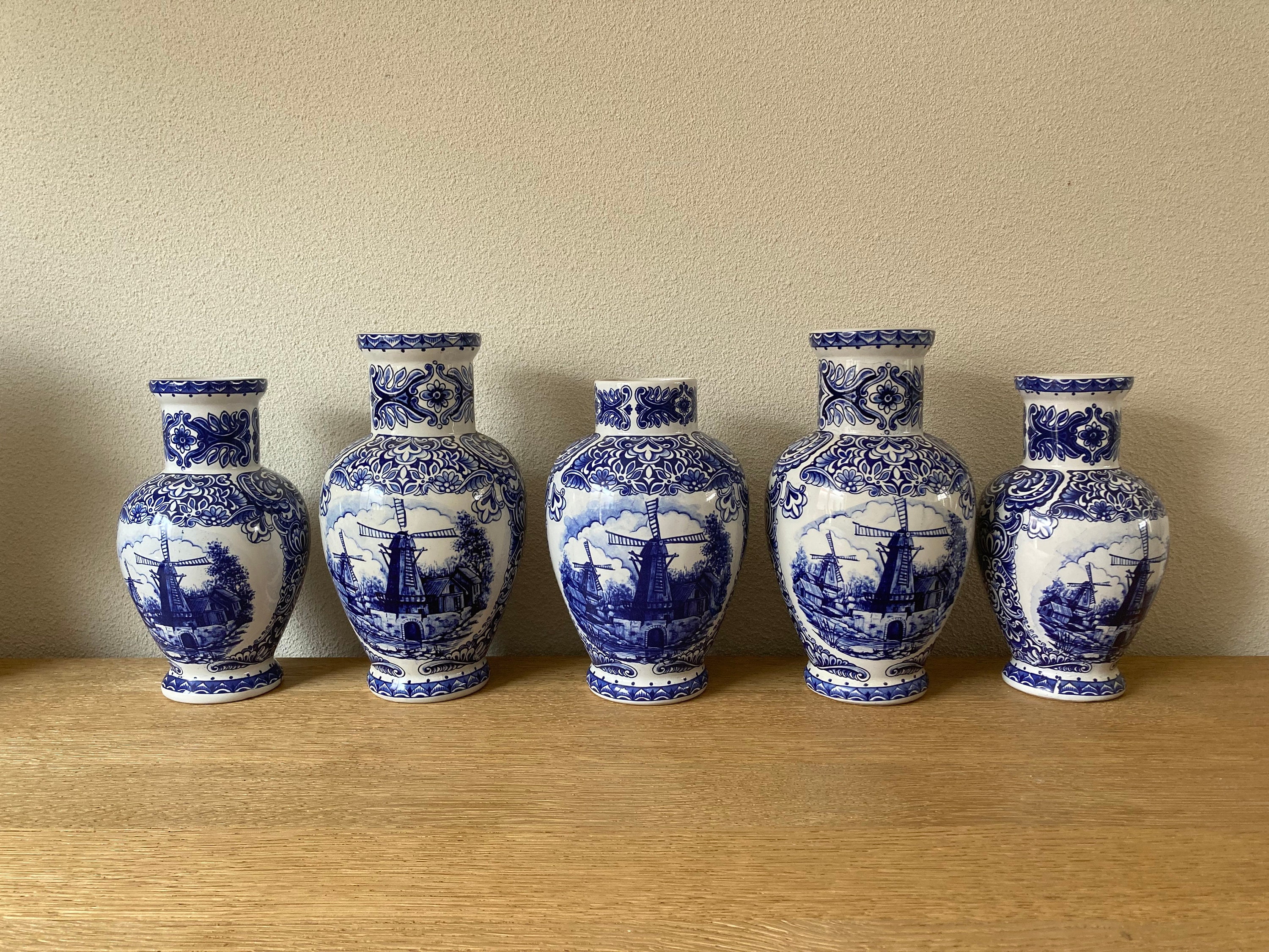 Vintage delft blue vases set. Five pieces.