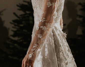 Abito da sposa in pizzo: abito da sposa con fiori 3D a maniche lunghe, schiena scoperta