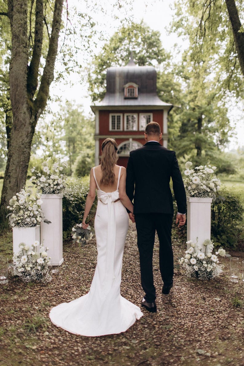 Robe de mariée Paparazzi nuisette ivoire à nœud dos et traîne