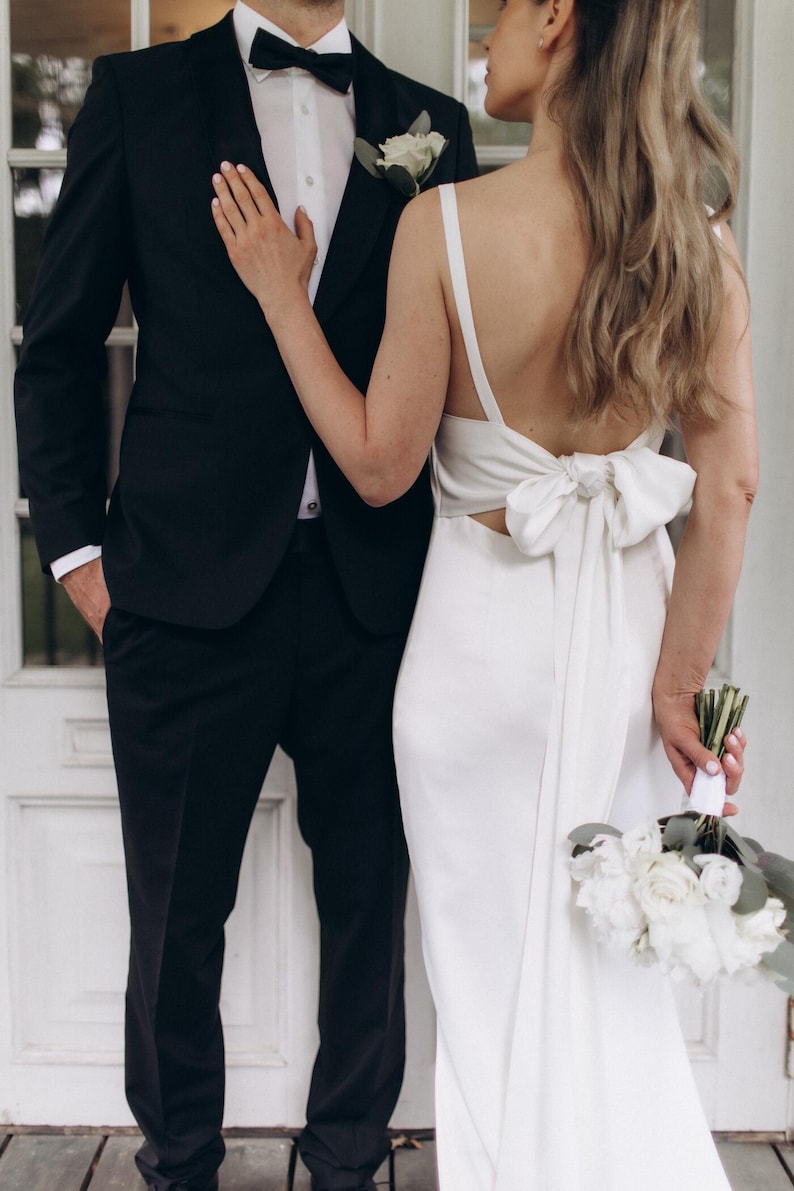 Robe de mariée Paparazzi nuisette ivoire à nœud dos et traîne