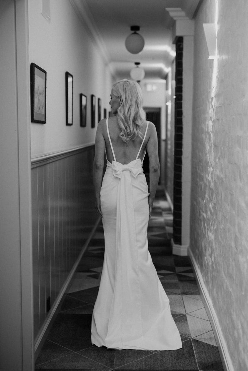Robe de mariée Paparazzi nuisette ivoire à nœud dos et traîne