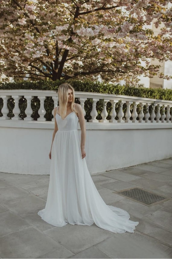 Ivory Chiffon Wedding Dress: Flowing A-Line Bridal Gown Ivory Chiffon Wedding Dress: Flowing A-Line Bridal Gown