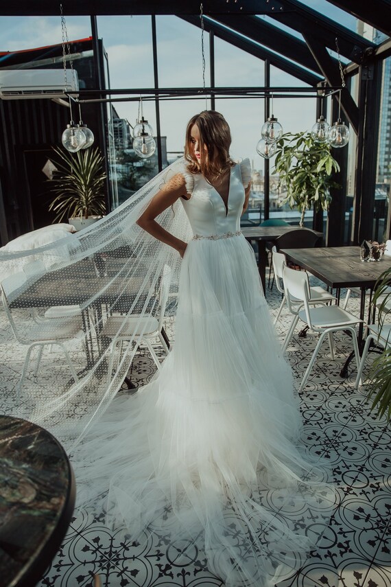 deep v tulle wedding dress