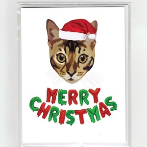 Gato de Bengala Feliz Natal Cartão Gatos Engraçado Fofo, Ilustração Chapéu de Papai Noel Balões Concha de Tartaruga
