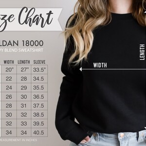 May include: A black Gildan 18000 heavy blend sweatshirt with a size chart. The chart shows measurements in inches for width, length, and sleeve length, ranging from size small to 5XL. The text "Size Chart" is at the top.